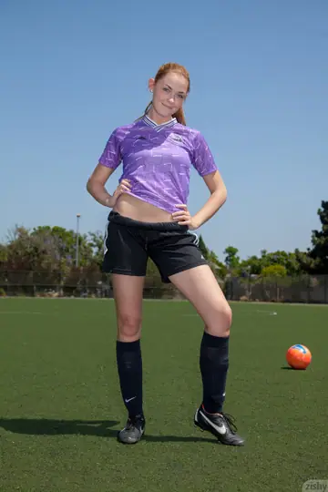 Bailey Rayne – Redhead Pulls Down Her Shorts to Flash Her Ass on a Soccer Field