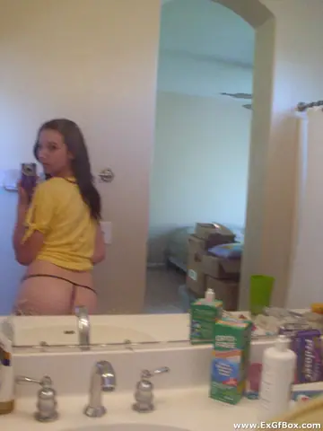 Thick Amateur in a Black Thong Spreads for a Mirror Selfie