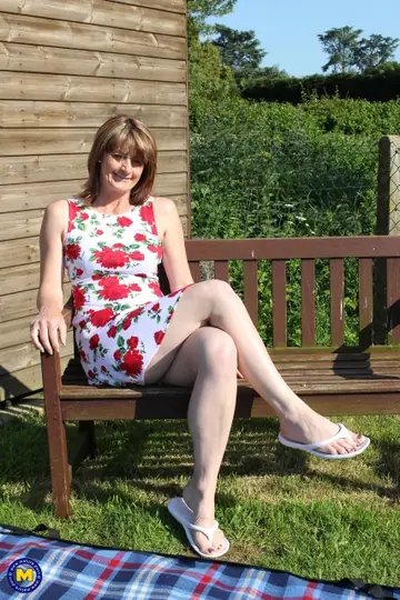 European Redhead MILF Strips Out of Her Dress Outdoors