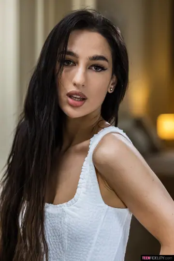 Kama Oxi – Brunette in High Heels Strips Nude and Shows Her Body