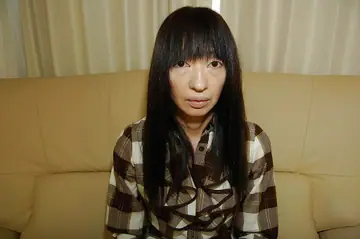 Mature Japanese Brunette in Lingerie Exposes Her Hairy Pussy