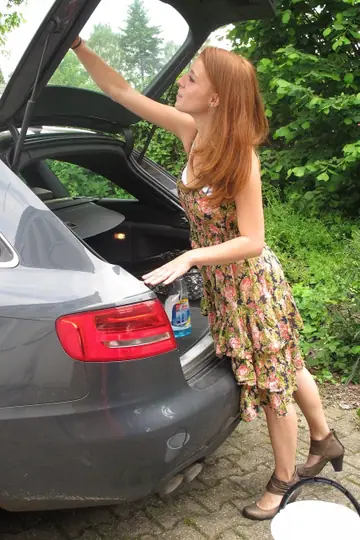 German Redhead Fingers Herself and Fucks in a Public Car