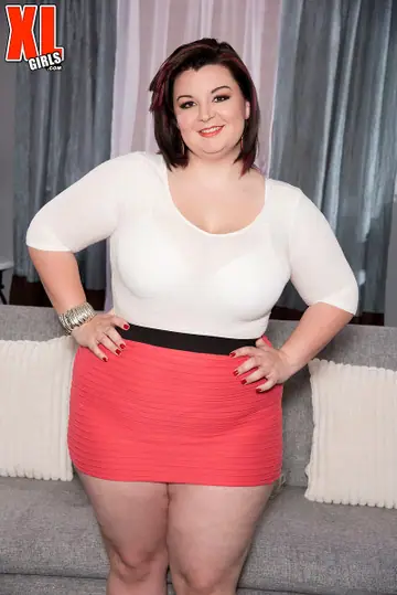 Lucy Lenore – Curvy Brunette MILF Poses in a Skirt and Panties Showing Her Big Tits