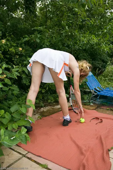 Slim Blonde MILF Strips Off Her Tennis Uniform and Spreads Hairy Holes