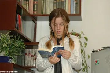 Woman in Pigtails Lifts Her Skirt to Show Cotton Panties