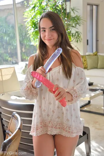 European Brunette Undresses and Fucks a Toy Outdoors