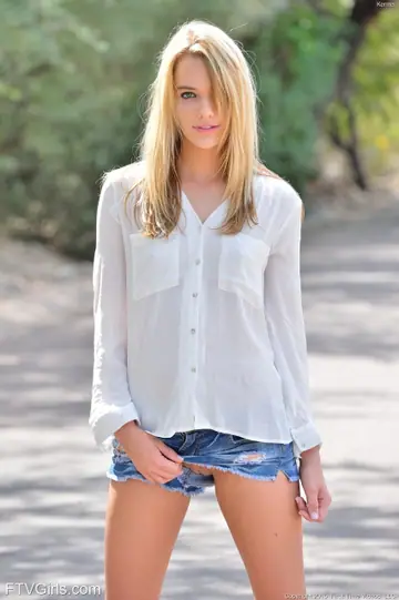 Kenna James – Tall Slim Blonde Spreads Her Legs in Shorts on the Road