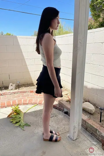 Petite Brunette Undresses to Show Her Big Ass