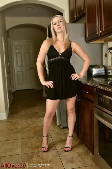 Sydney Paige – Thick Blonde MILF in a Skirt and Panties Spreads Her Ass in the Kitchen