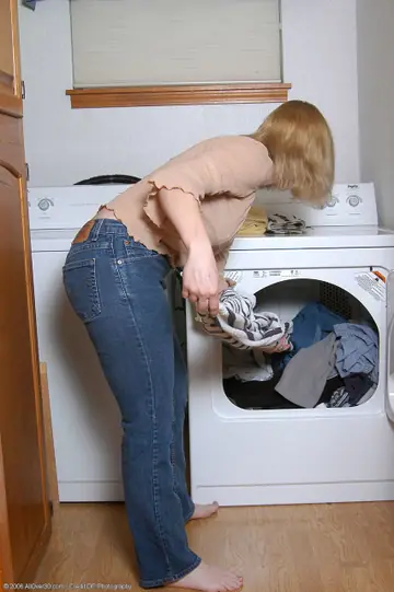Pale Redhead MILF Strips Out of Her Jeans and Spreads Her Pussy