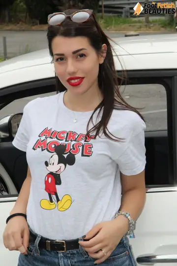 European Brunette Shows Her Soles in the Car Wearing Shorts and Top