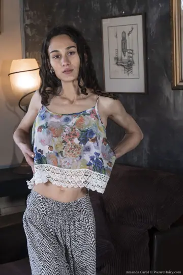 Amanda Carol – Tall Slim Brunette with Big Fake Tits Strips and Spreads Her Hairy Pussy