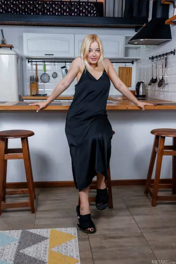 Bianca Bell – Busty Ukrainian Blonde Strips Out of Her Skirt in the Kitchen