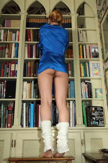 Aurora Zvezda – Petite Redhead in Socks Rides a Toy on the Floor Mirror