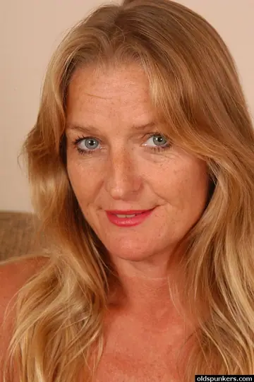 Hairy Mature Blonde with Big Tits Strips Out of Her Panties