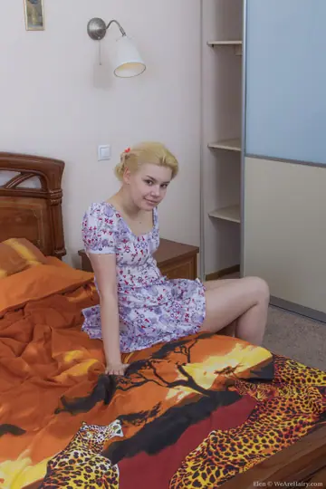 Russian Blonde Pulls Aside Her Panties to Show Her Hairy Pussy