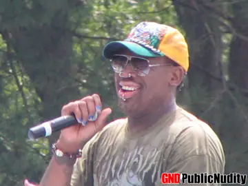 BBW with Glasses Strips Nude at Outdoor Festival