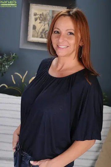 Gia Sophia – Mature Redhead with Big Tits Strips Out of Her Jeans