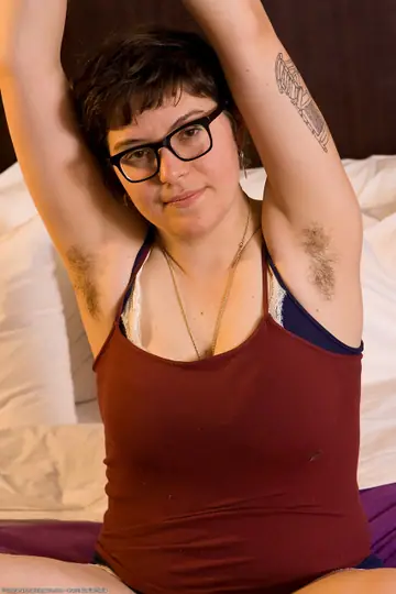 BBW Brunette Undresses to Show Her Hairy Bush and Big Tits