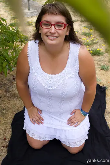 Chubby Brunette in Glasses Undresses and Spreads Outdoors