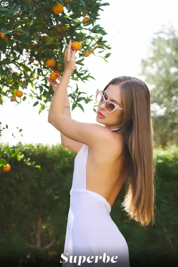 Skinny Woman in Glasses and Heels Spreads Her Legs