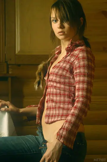 Brunette Sheds Her Jeans and Top to Pose Nude