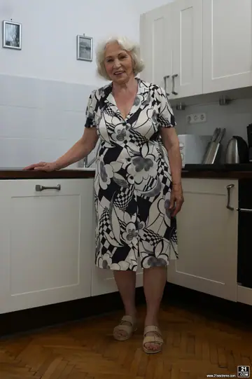 Short-Haired Blonde Bares Her Big Tits in the Kitchen