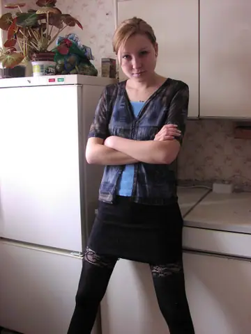 European Woman in Stockings Pulls Them Aside to Show Her Hairy Bush