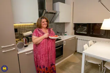 Curvy European MILF Undresses in the Kitchen