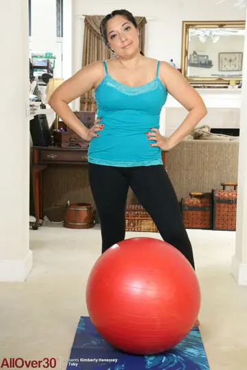 Kimberly Henessey – Latina MILF with Big Tits Strips and Spreads in the Gym