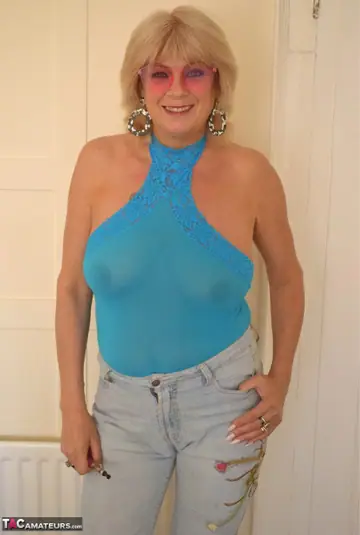 Blonde MILF Strips Out of Her Jeans on the Beach with Ice Cream