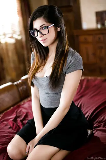 Ava Taylor – Busty Brunette in Glasses Strips Out of Her Lingerie in the Bedroom