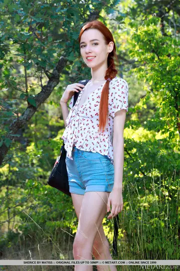 Redhead Spreads Her Shaved Pussy Outdoors at a Camping Tent