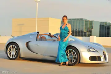 Megan Loxx – Busty Redhead Strips Out of Her Dress in the Car