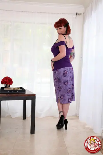 Kylie Ireland – Redhead MILF Strips and Bends Over Showing Her Pierced Big Tits