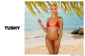 Cherry Kiss – Skinny Blonde Takes Anal Doggy Style on the Beach