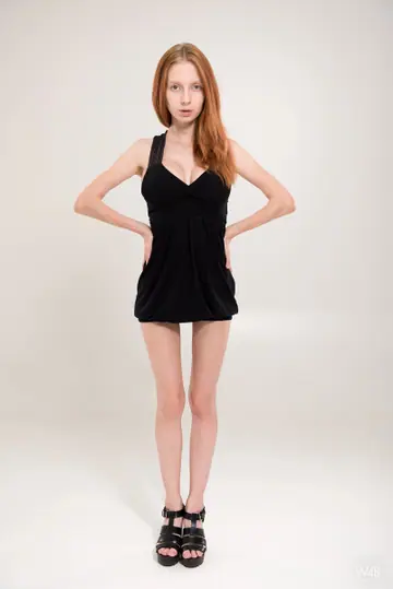 Helga Grey – Slim Redhead Oils Up Her Big Natural Tits