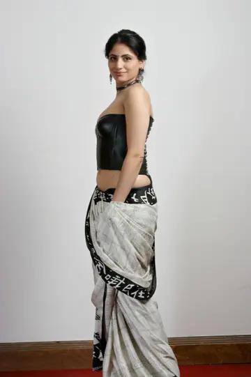 Indian Brunette Reveals Her Hairy Bush in a Leather Skirt and Panties