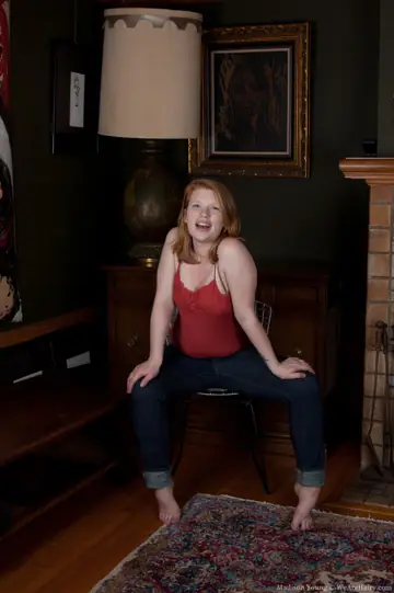 Thick Redhead Pulls Down Her Jeans and Shows Her Hairy Pussy