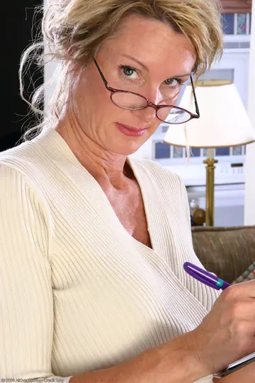 Hairy MILF in a Skirt and Glasses Spreads for Anal