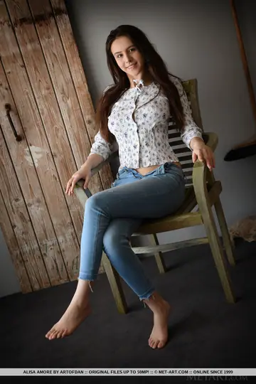 Busty European Brunette Strips Out of Her Jeans