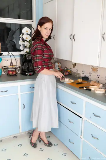 Carmen December – Redhead in Heels Spreads Her Hairy Pussy in the Kitchen
