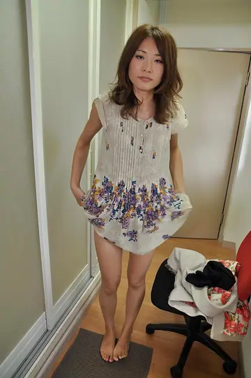 Japanese MILF Undresses and Poses in the Bathroom