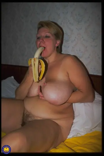 Mature European Blonde Strips and Shows Her Big Tits
