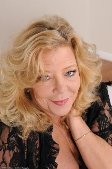 Curvy Blonde MILF with Big Natural Tits Shows Off Her Hairy Pussy in Lingerie
