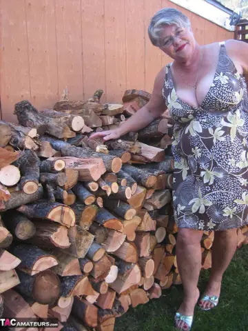 European BBW Strips by a Wood Pile Outdoors