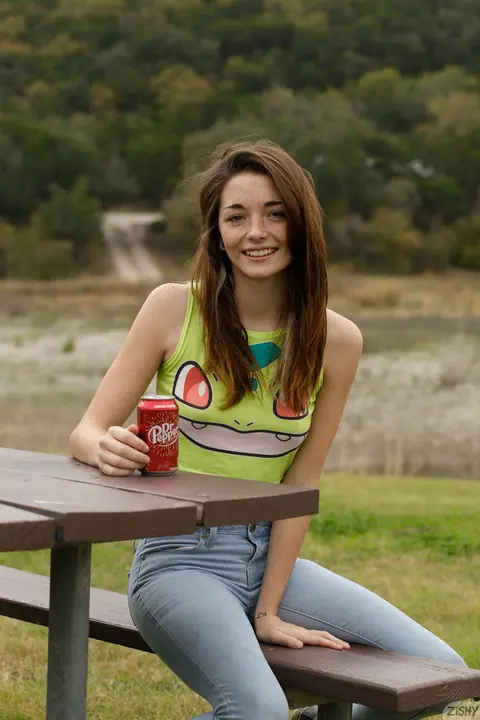 Hannah Tarley: Slim Brunette Shows Her Ass and Small Natural Tits in Jeans Outdoors – photo 2 of 12