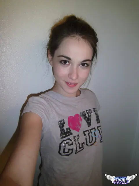 Emily Grey: Brunette Peels Off Her Shorts for a Selfie – photo 1 of 12