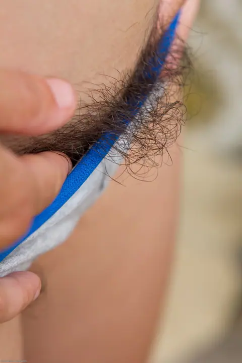Slim Hairy Amateur in Pigtails Strips and Spreads Her Pussy – photo 11 of 20