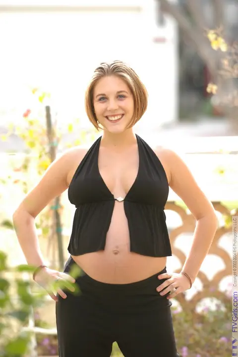 Pregnant Redhead Bares Her Big Tits Outdoors – photo 2 of 20